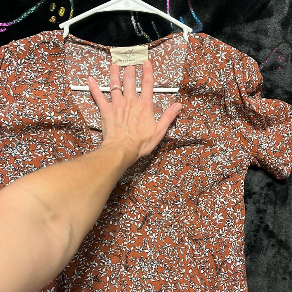 Size small hyped unicorn dressy low cut top.
